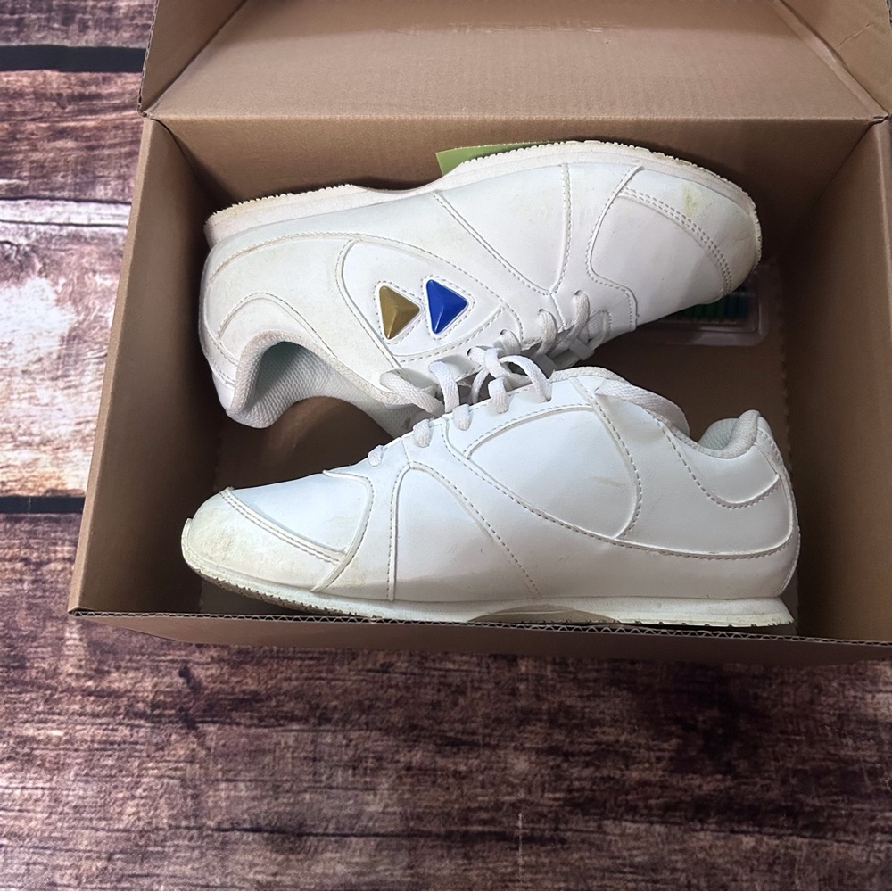 White cheer sneakers by Kaepa size 6 (womens) in like new condition.